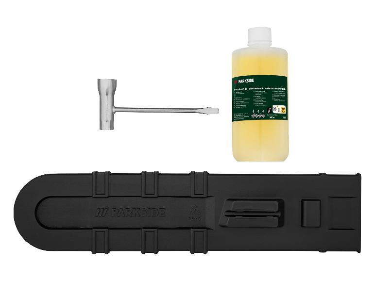 Parkside kettingolie, gereedschap en een zwarte kunststofhouder.